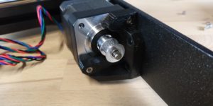 Push the pulley onto the Y axis motor and make sure the grub screw is aligned with the flat part of the shaft as shown.