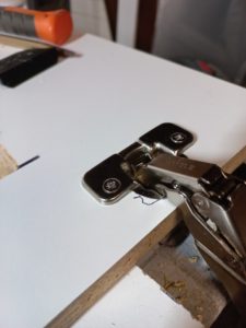 Cabinet hinge installed using 3d printed drilling templates